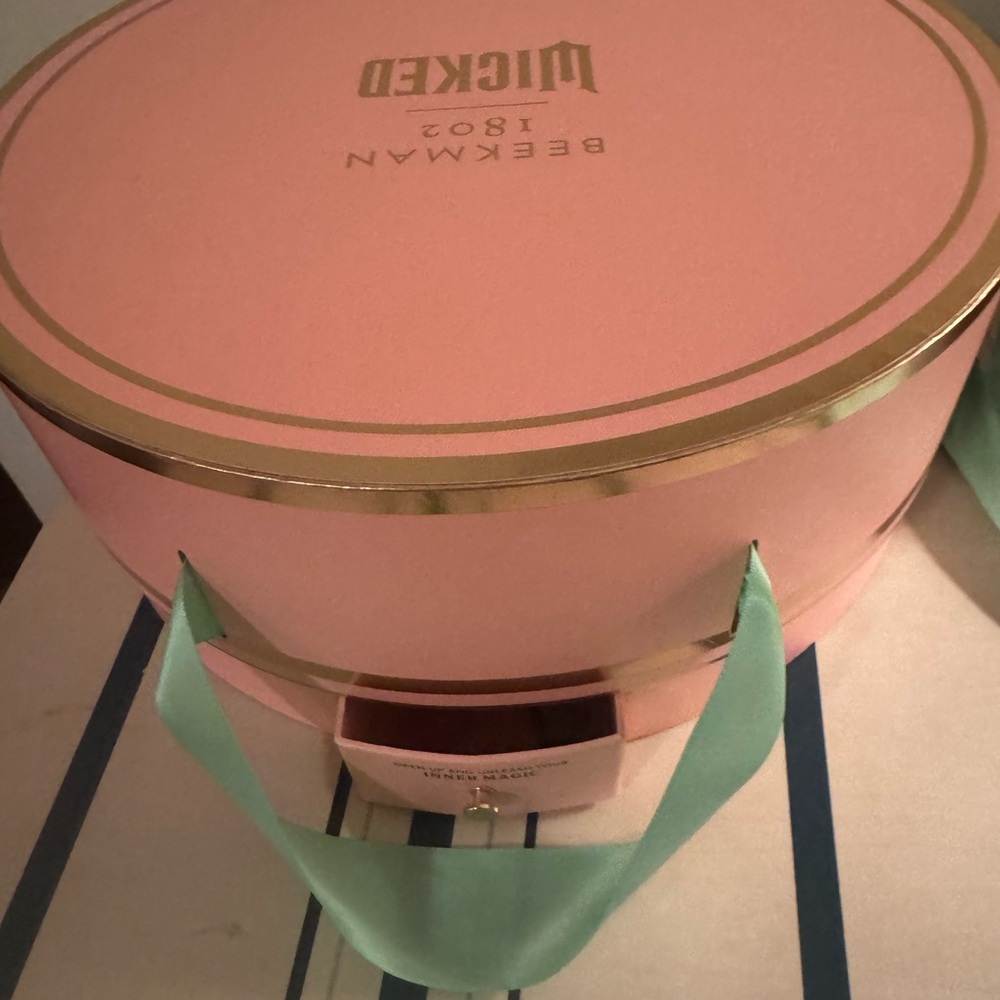 Lovely Beekman "Wicked" Pink Box with skincare products and secret drawer.